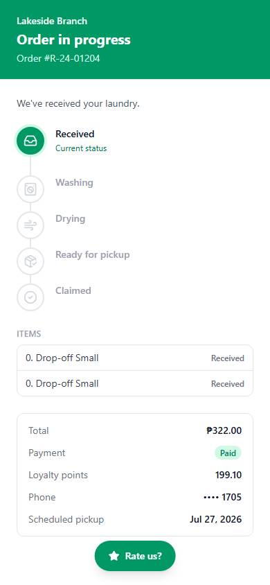 Customer tracking page on a phone showing the order status stepper, the order totals, and a green Rate us button floating at the bottom of the screen