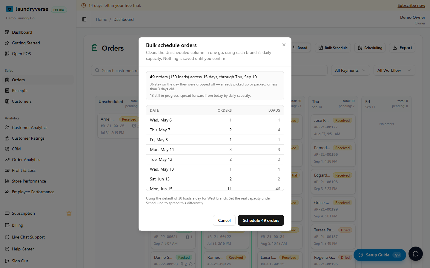 The Bulk schedule orders dialog, showing 49 orders across 15 days, how many keep their drop-off day, and a table of each date with its order and load counts